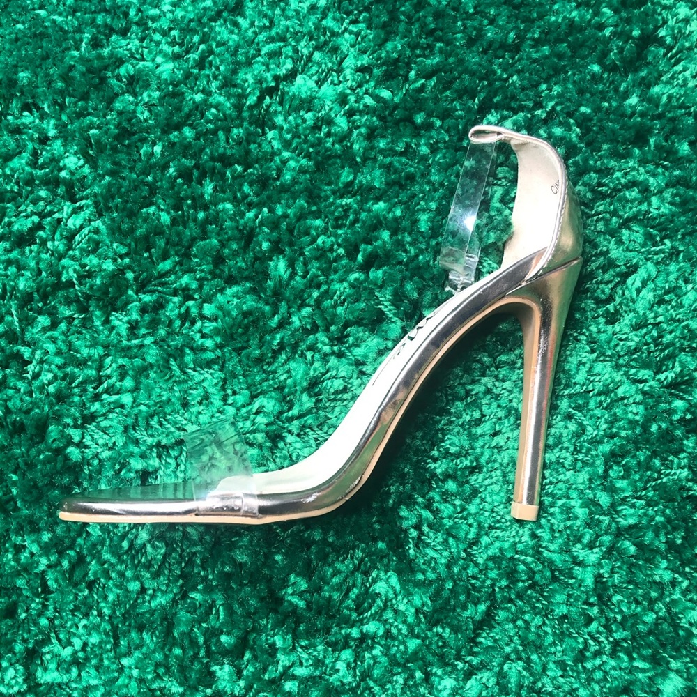 Never worn rose gold with clear strap high heels